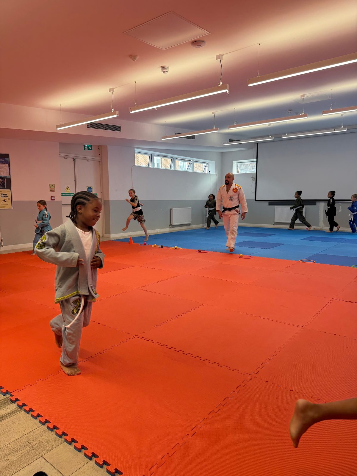 Young student practising on the mats